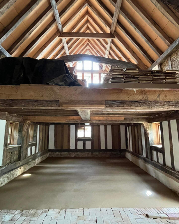 Earth floor in timber frame