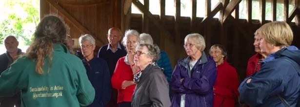Visitors enjoying a talk at Orchard Barn